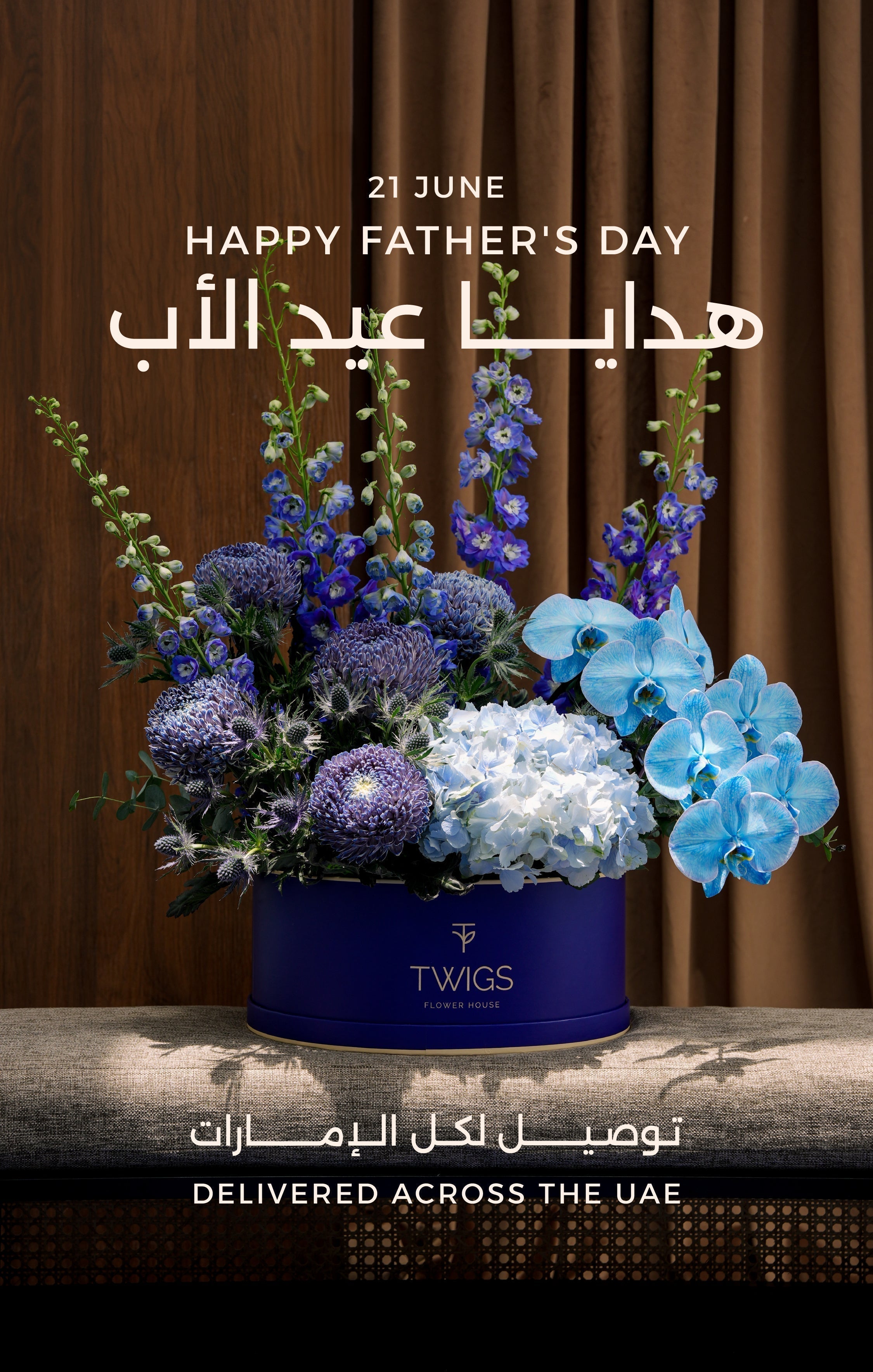 For Him Blue Collection — TWIGS navy round and square boxes with blue delphiniums, hydrangeas and chrysanthemums, Father's Day flowers Dubai 2026