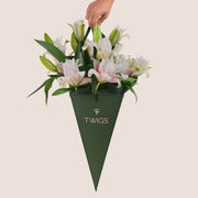 Double Petalled Lilies in TWIGS Cone-Shaped Carry Bag– Elegance in Every Petal