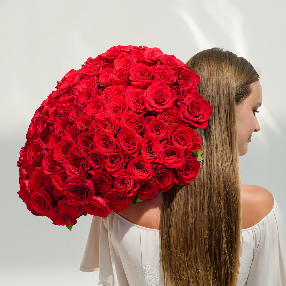 100 stems premium red roses. Available for same-day flower delivery in Abu Dhabi, Dubai, and across the UAE.