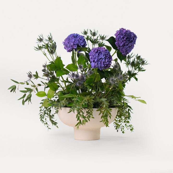 Purple Hydrangea Flower Arrangement In ceramic vase