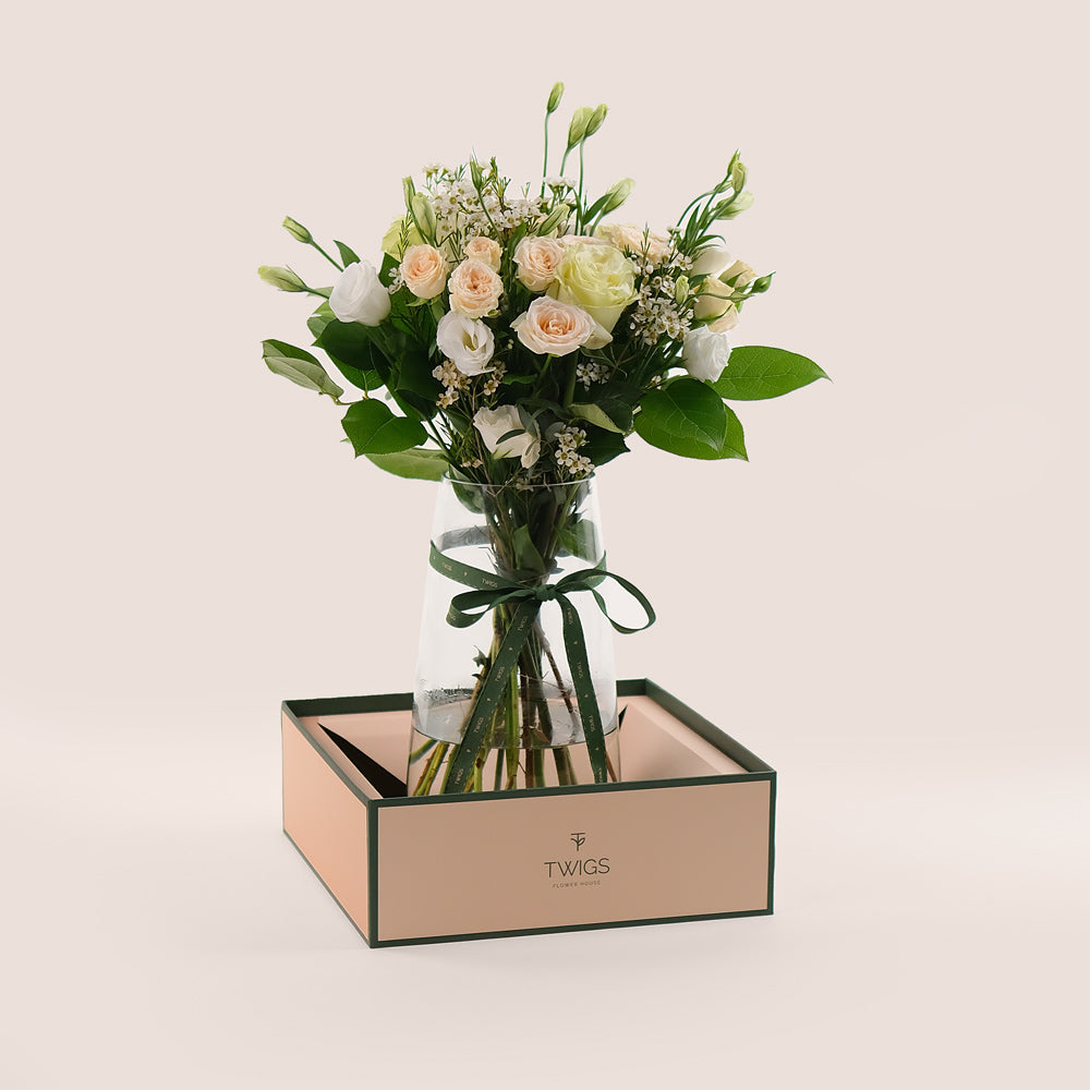 Pastel Floral Mix in a Tall Glass Vase – Timeless Elegance with a Modern Touch