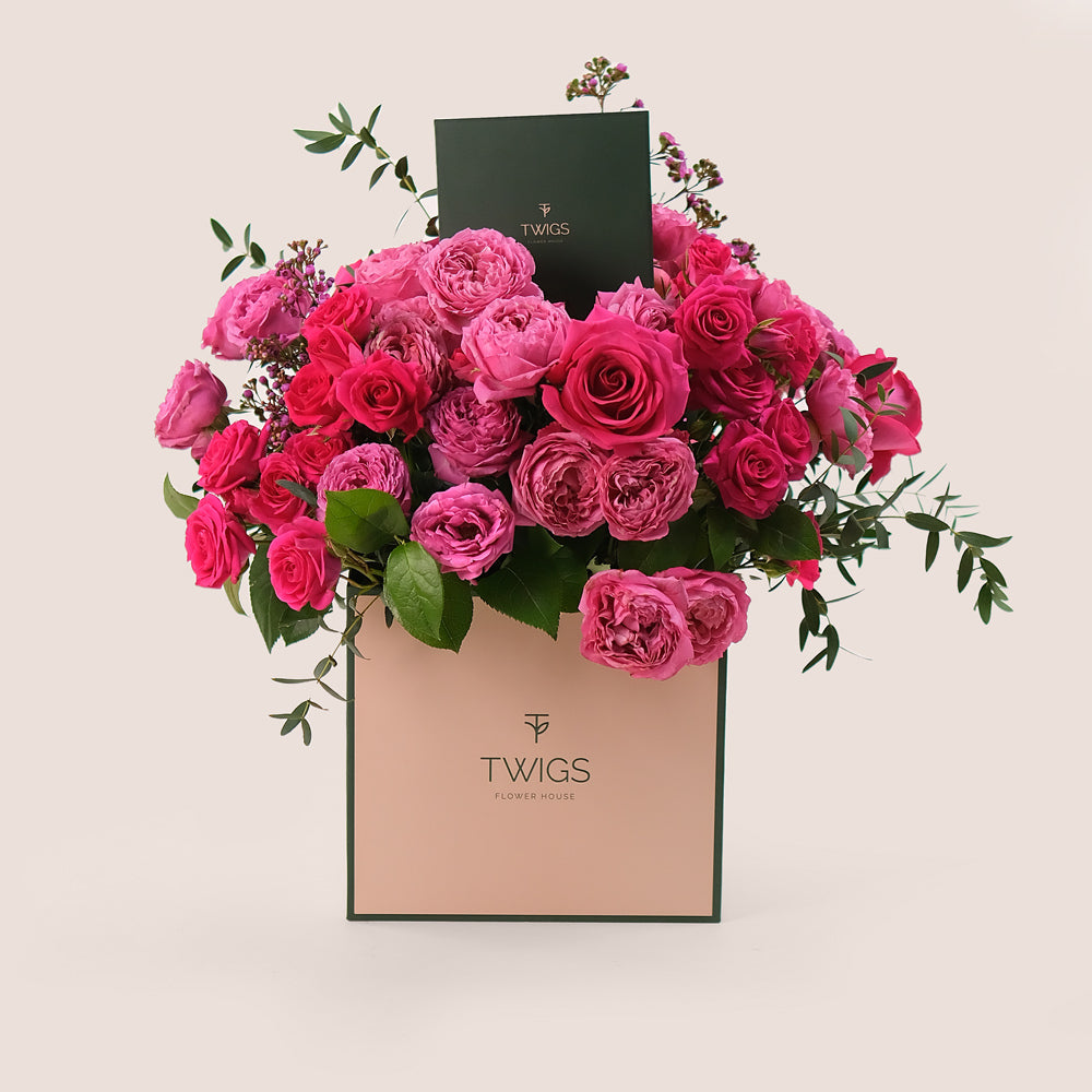 Fuchsia Delight – Square Box Bouquet of Fuchsia & Pink Roses