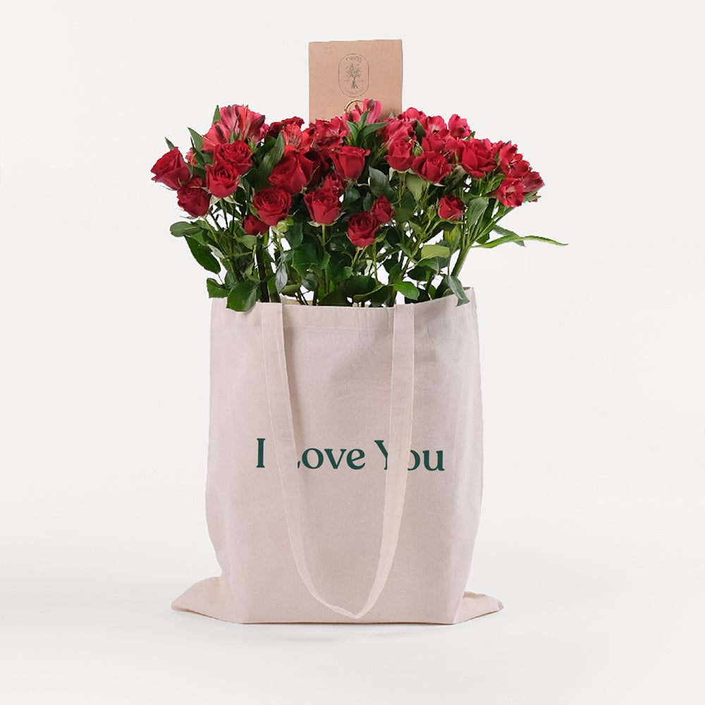 Red Spray Roses & Red Alstroemerias in a Reusable Canvas Tote – A Passionate Blend for Memorable Moments