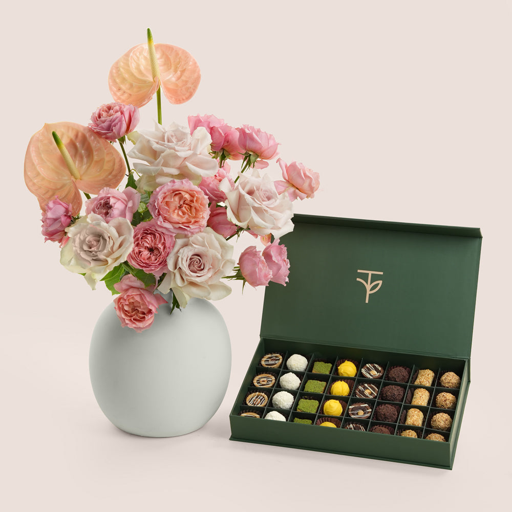 TWIGS Uns ceramic vase arrangement and premium petite fours assortment — same-day Eid gift delivery UAE