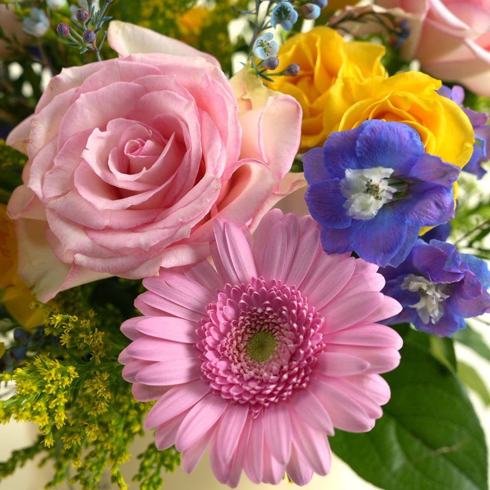 pink gerbera and pink roses