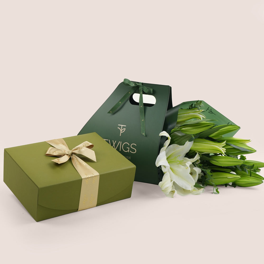 Bateel stuffed dates with fresh lilly flower bunch dubai UAE