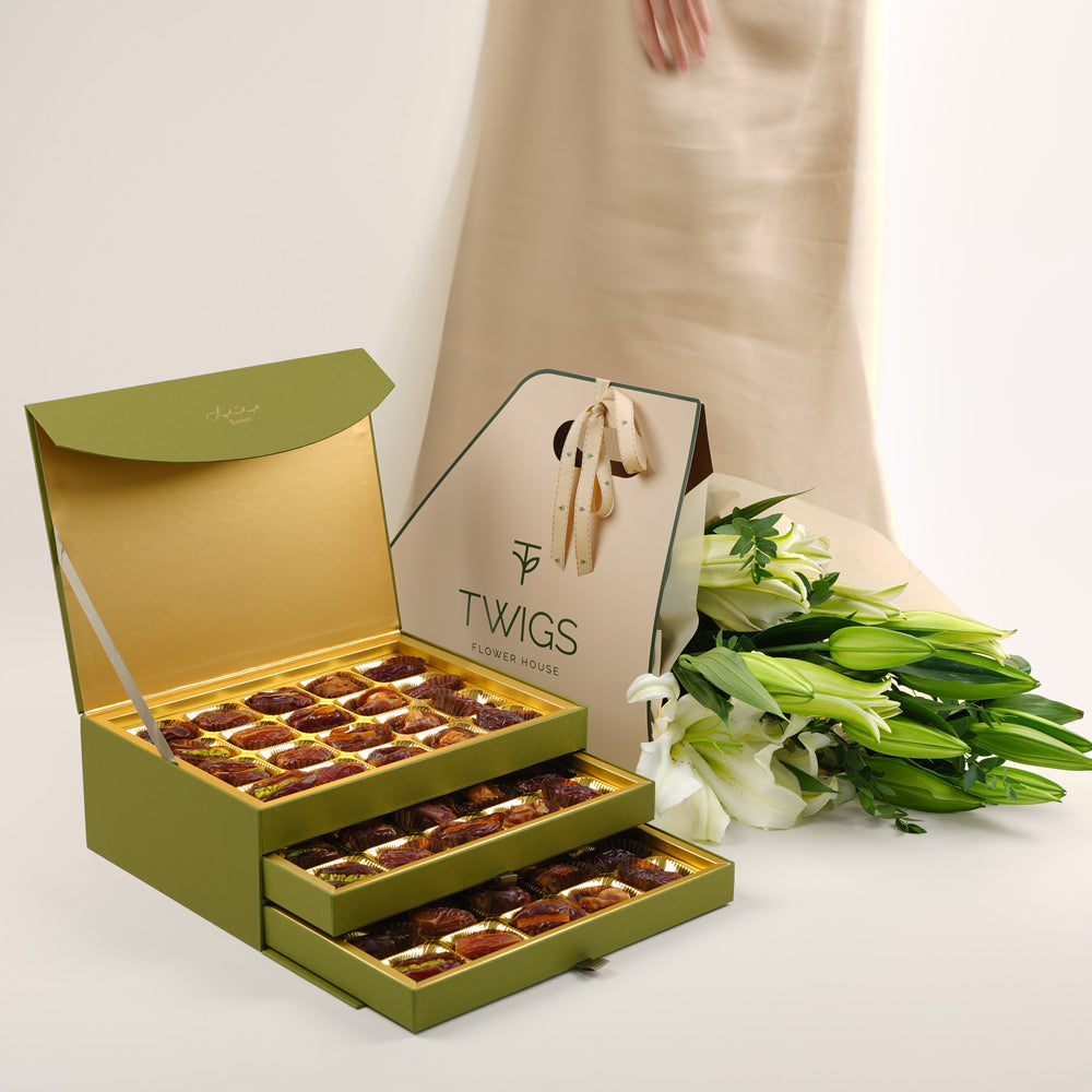 Bateel stuffed dates with fresh lilly flower bunch dubai UAE
