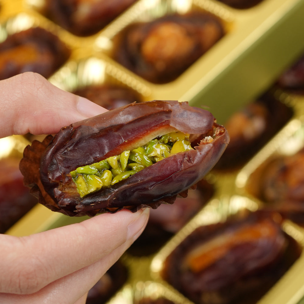 Bateel stuffed dates with fresh lilly flower bunch dubai UAE