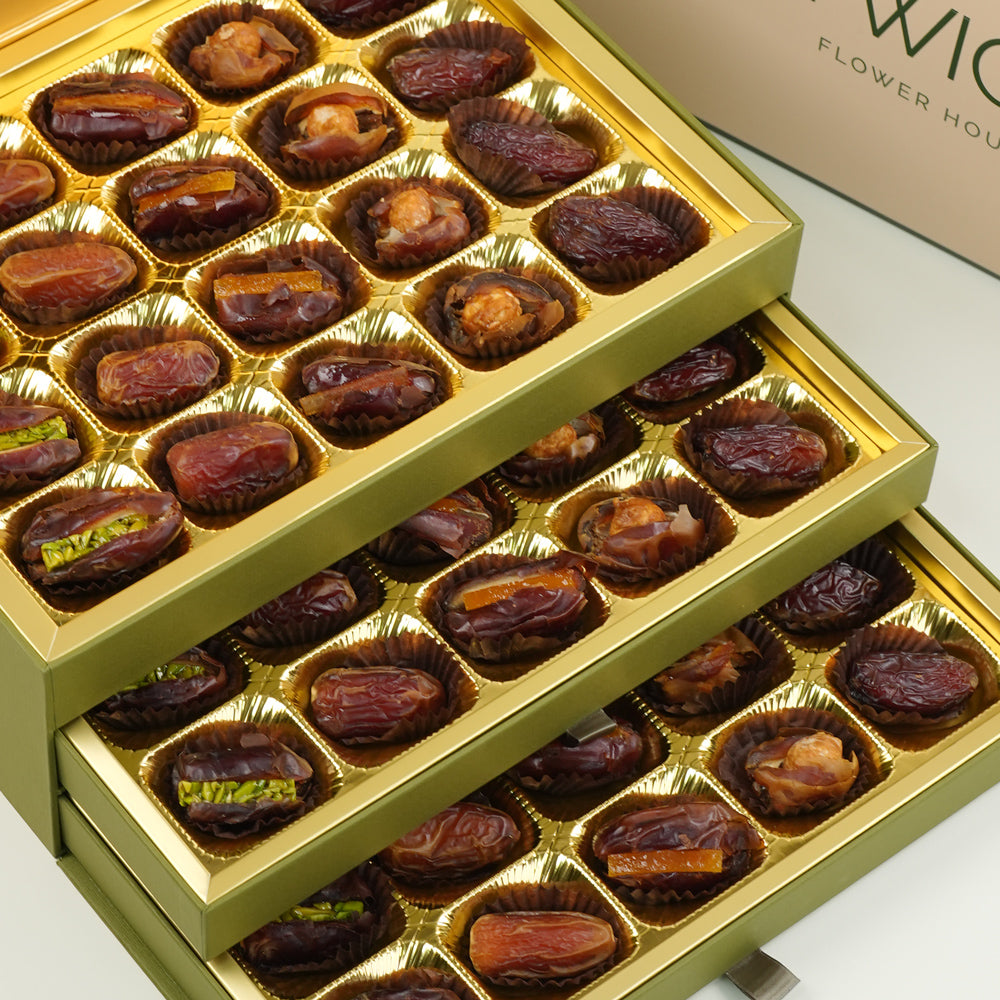 Gold chocolate box with dates inside, 