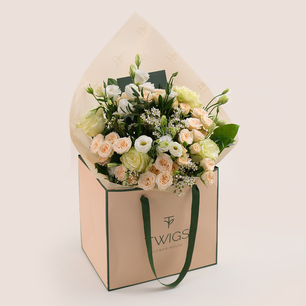 Mother' Day Ivory Bloom Hand Flower Bouquet in TWIGS Signature Bag