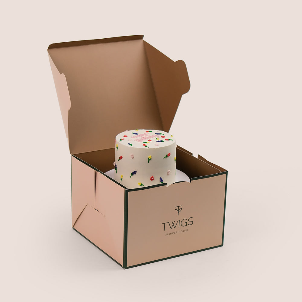 Happy Birthday cake with flowers in TWIGS signature beige box