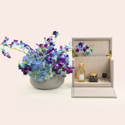 Blue dendrobium orchid and hydrangea in TWIGS grey ceramic vase with Lootah perfume and bakhoor gift set — Eid Al Adha Dubai