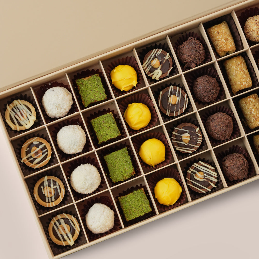 Bahar & Truffles Blue Orchid Ceramic Vase · Premium Truffles & Petite Fours · Eid Al Adha Gift Set