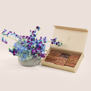 Blue dendrobium orchid and hydrangea in TWIGS grey ceramic vase with artisan chocolate box — Eid Al Adha gift set Dubai
