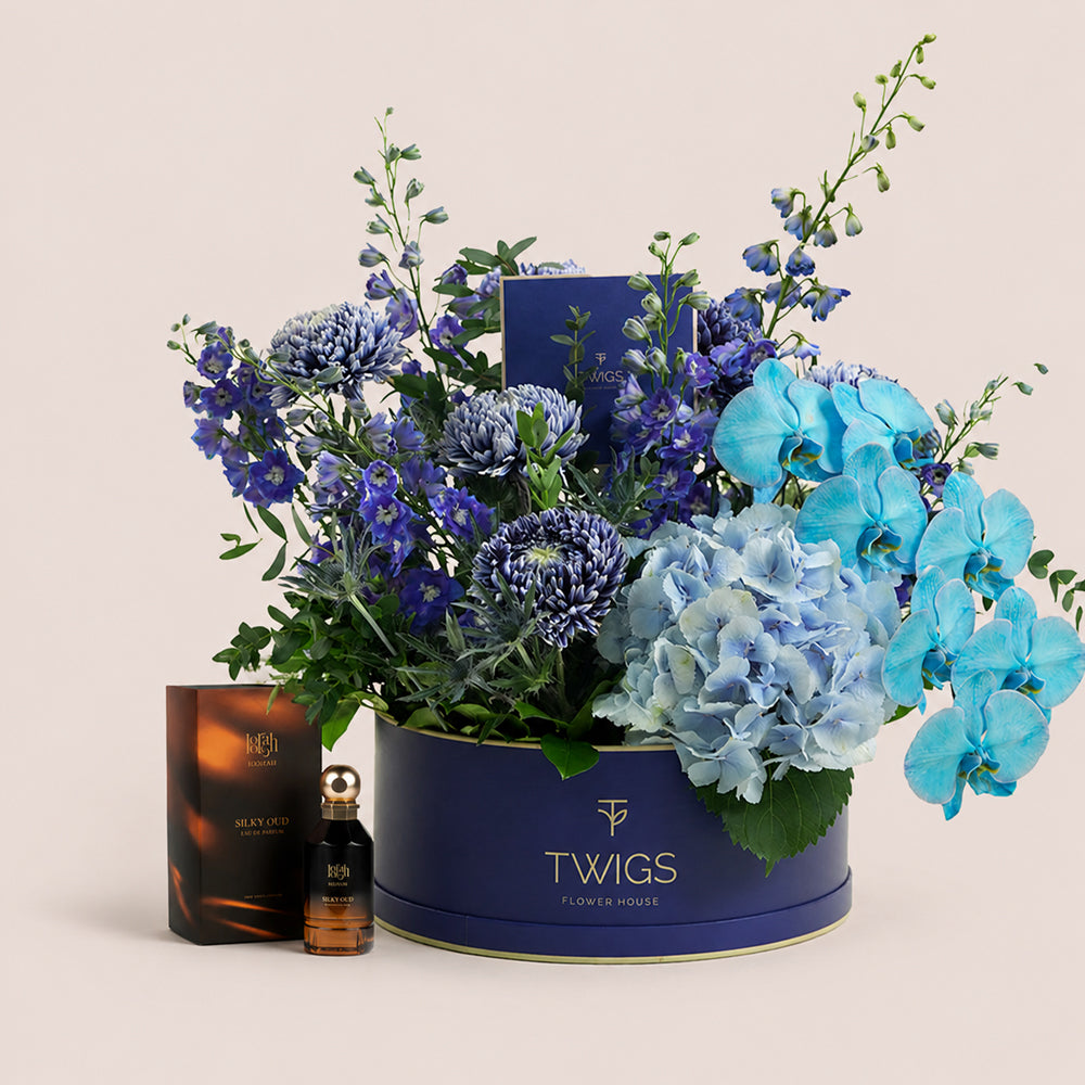 Blue Hour Grande navy round TWIGS flower box with Silky Oud perfume by Lootah Perfumes
