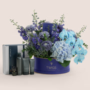 Blue Hour Ritual — blue delphiniums, chrysanthemums, hydrangeas and phalaenopsis orchids in a TWIGS navy round box alongside Rituals Homme Gift Set, Father's Day Dubai