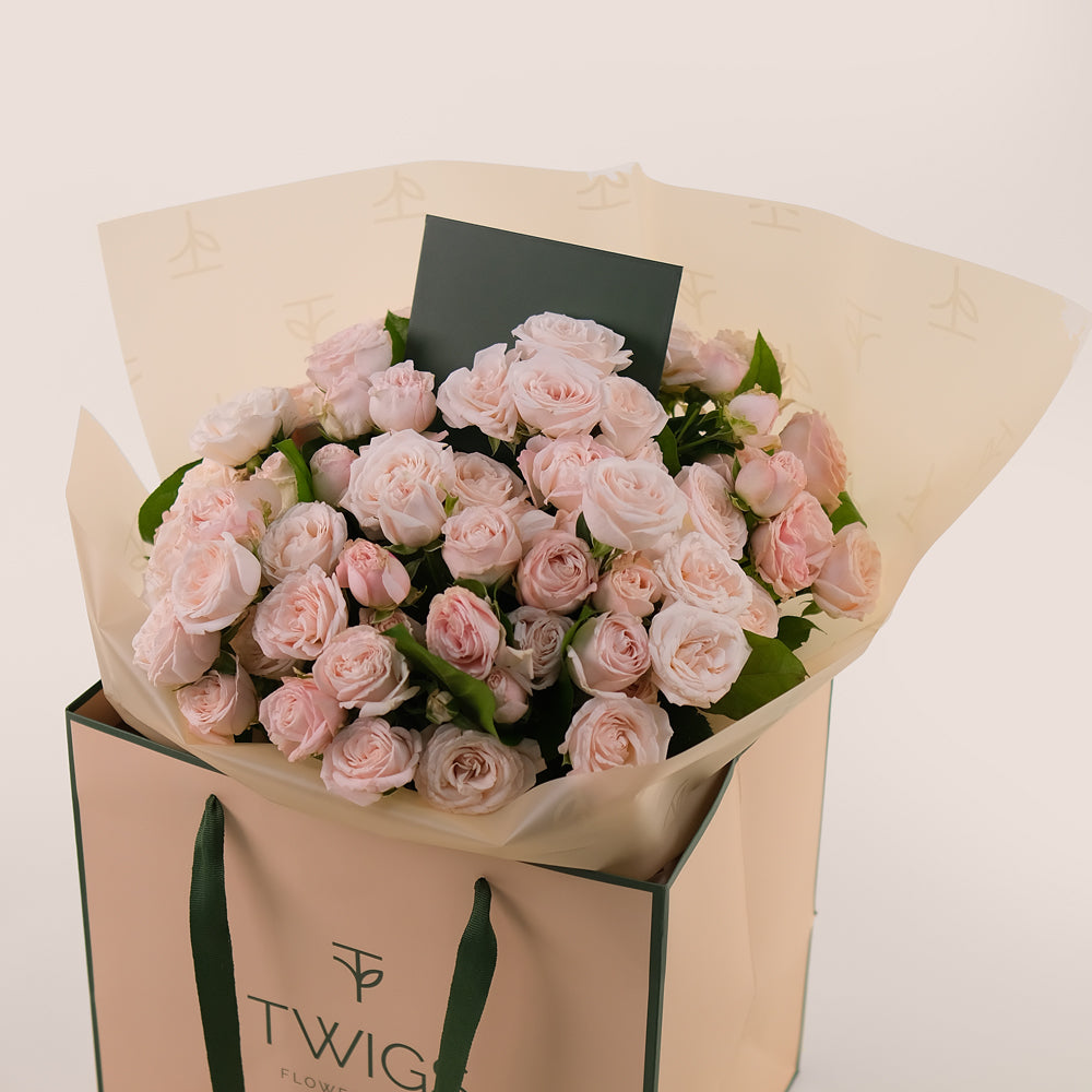 Bombastic Spray Roses Hand-Tied Flower Bouquet – Soft Elegance in Our Signature TWIGS Bag