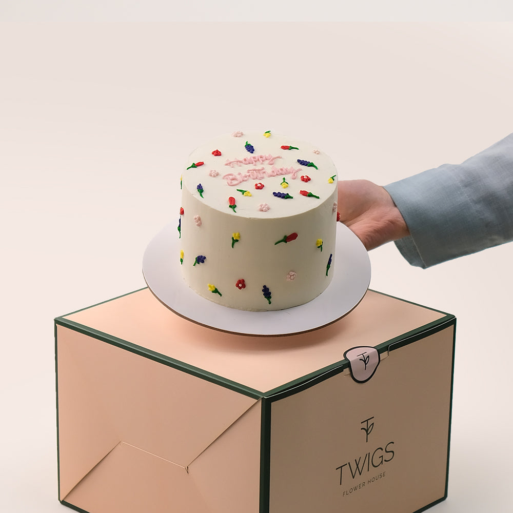  Flowers and small cake, purple balloons TWIGS UAE