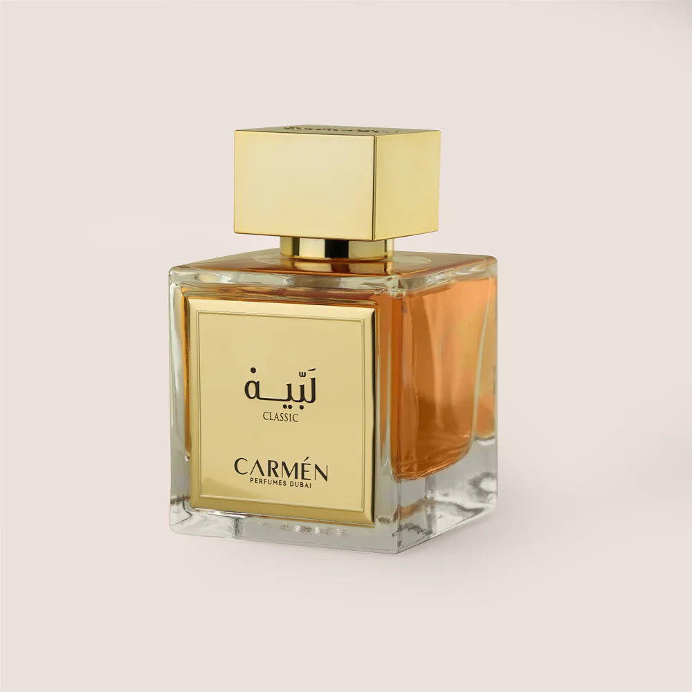 Perfume bottle with gold cap and label on a light beige background