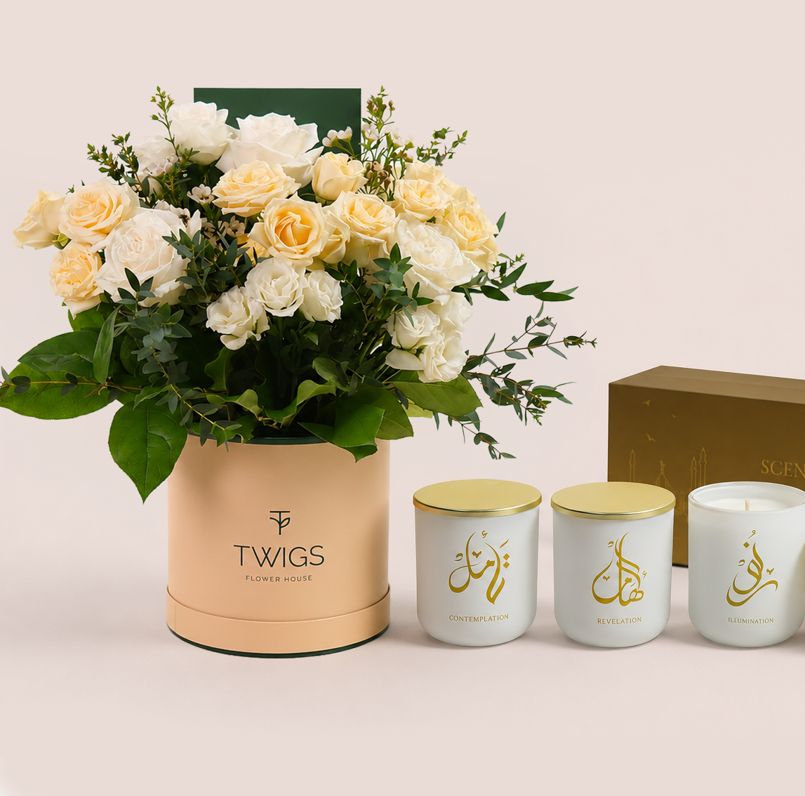 Cream and white roses with Salinero in a TWIGS box beside three Scent of Medina candles, TWIGS x Light of Sakina collaboration