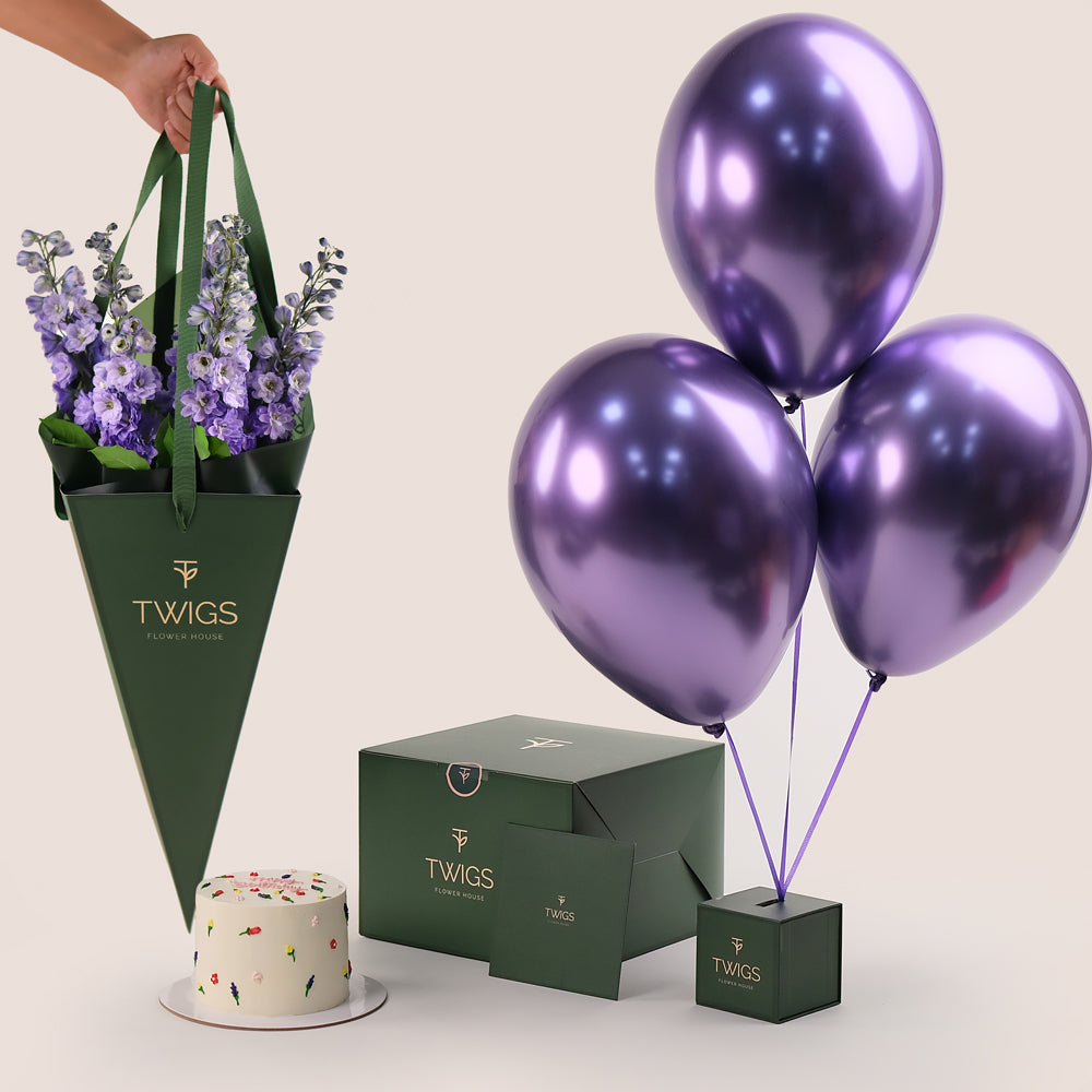  Flowers ,small Birthday cake, and purple balloons TWIGS UAE