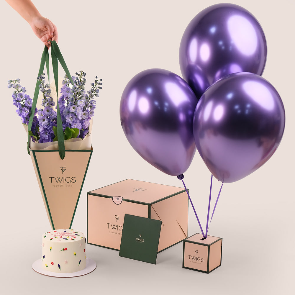  Flowers,small cake, and purple balloons TWIGS UAE