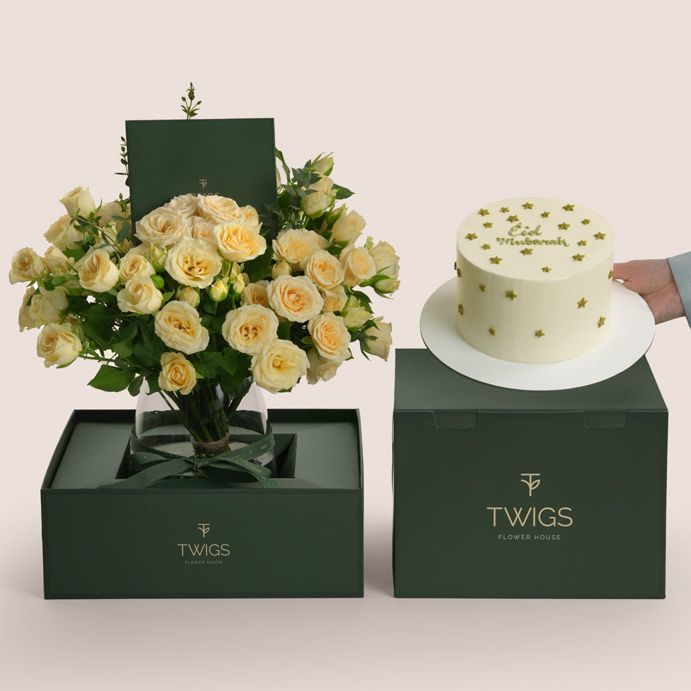 Eid flower vase arrangement with creamy roses in TWIGS carry box paired with celebration cake gift set Dubai