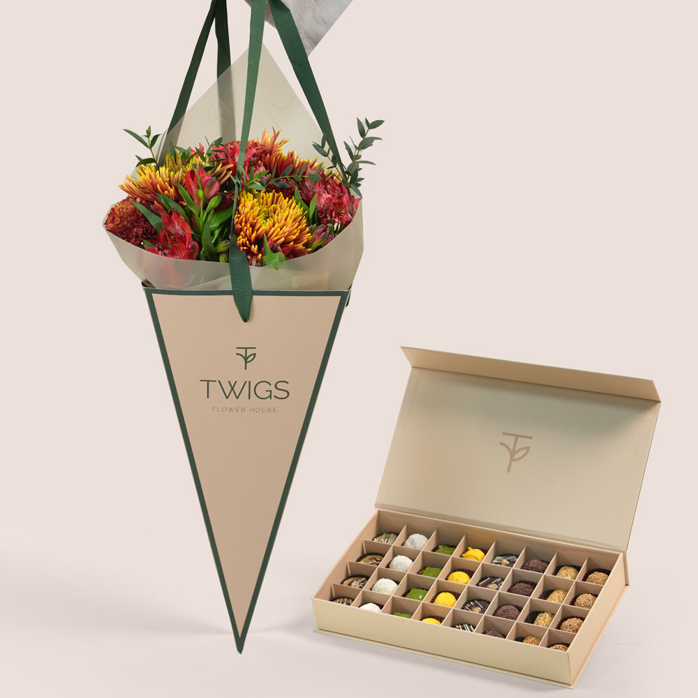 Ruby Eid bouquet in TWIGS cone bag with truffles and petite fours Eid gift box Dubai