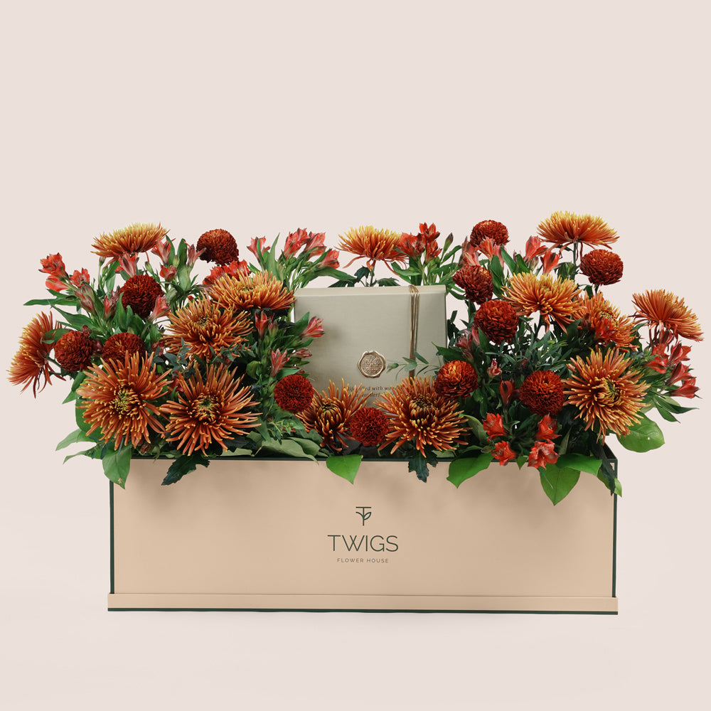 Eid garden box flower arrangement with saffina chrysanthemums, burgundy ping pong chrysanthemums and Rituals Sweet Jasmine gift set by TWIGS Flower House