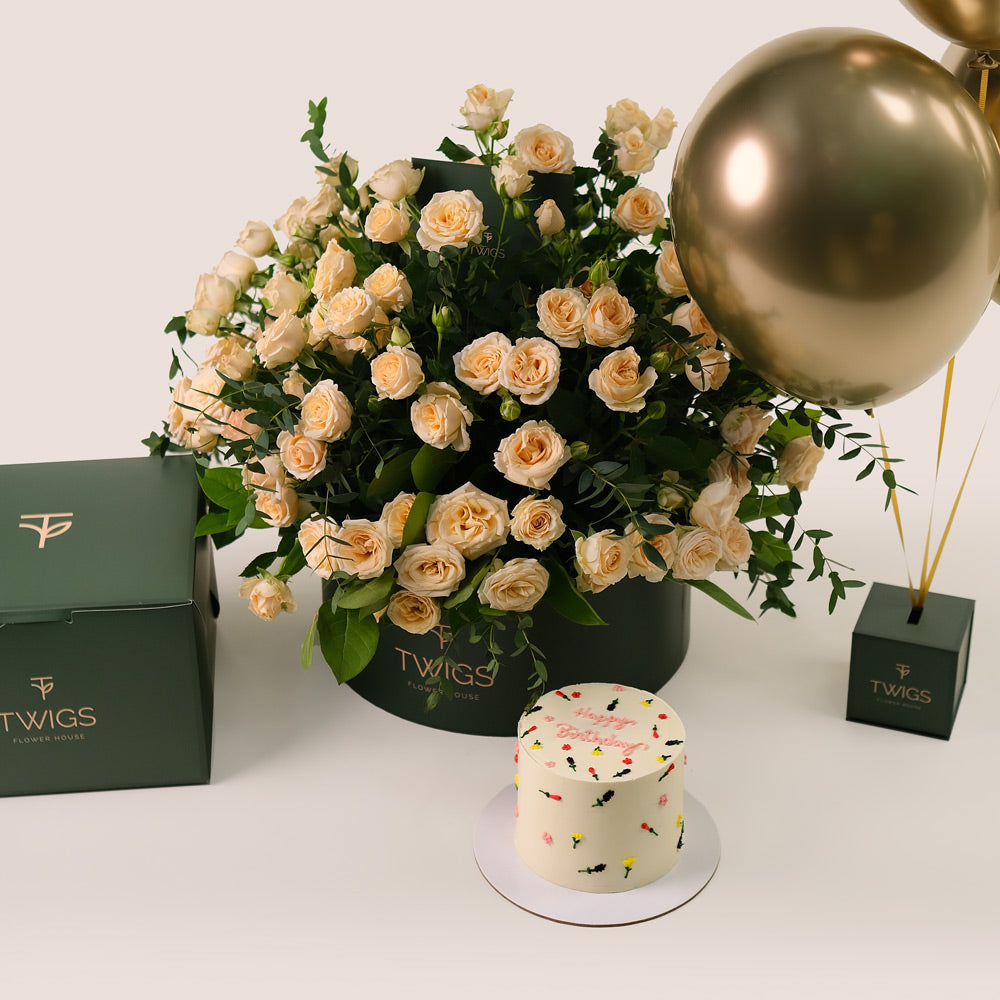 Cream Roses Flower Grande Round Box, Balloons & Birthday Cake Bundle – A Luxurious Trio for Unforgettable Birthdays