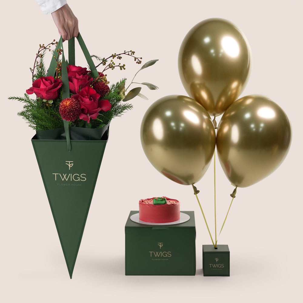 TWIGS Flower House Christmas gift bundle including red flower bunch, red holiday cake, and metallic gold balloons