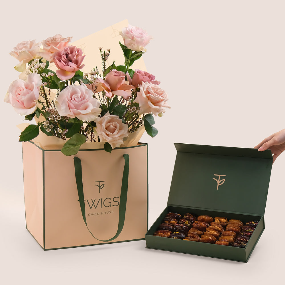 Elegant bouquet of café latte, mondial and quicksand roses in TWIGS beige gift bag paired with premium assorted stuffed dates gift box – luxury flower and dates gift Dubai.