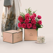 Fresh flowers fuchsia roses and cake gift bundle TWIGS Dubai
