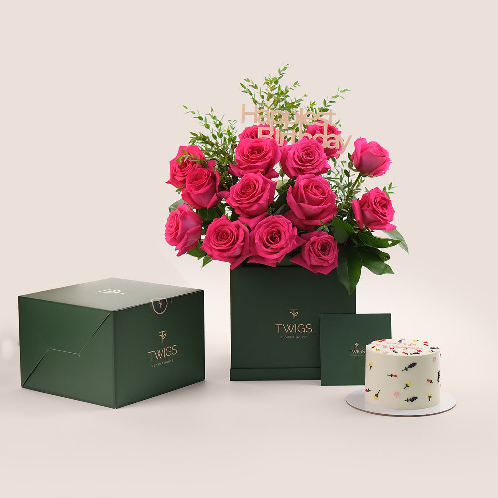 Fresh flowers fuchsia roses and cake gift bundle TWIGS Dubai