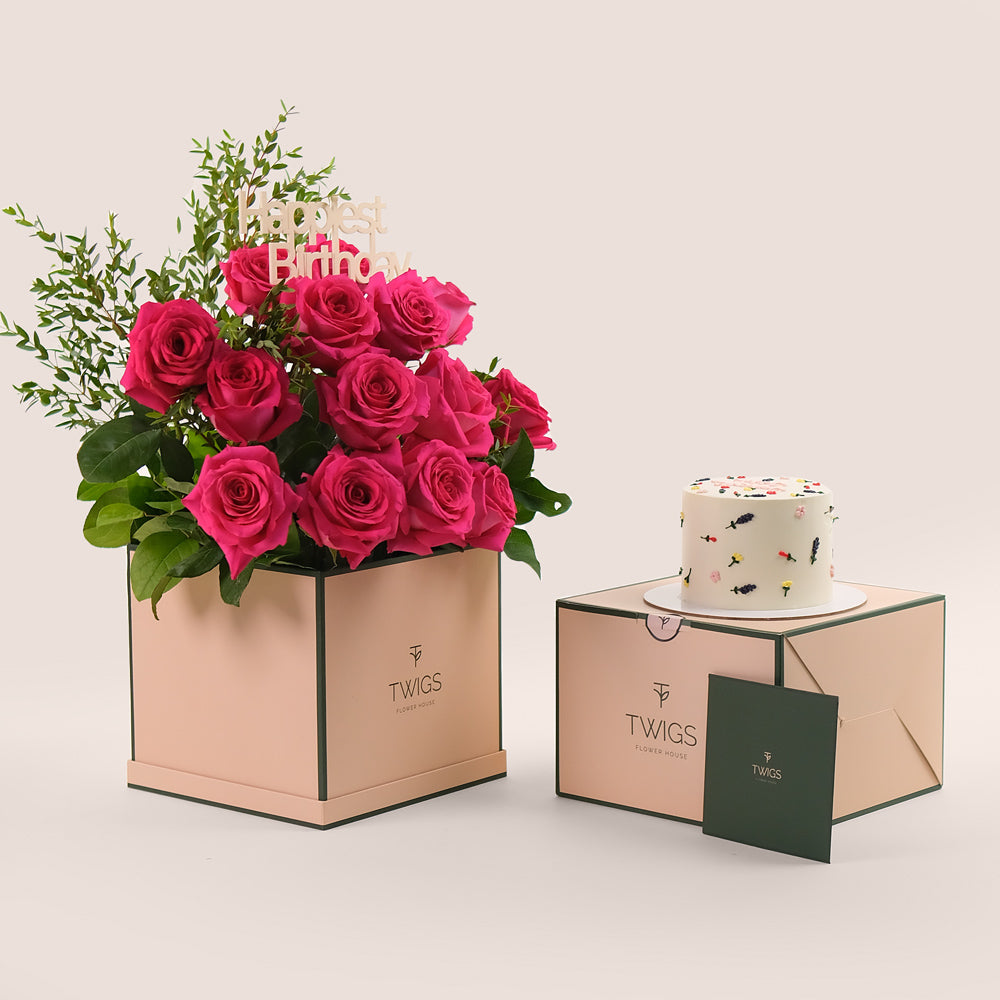 Fresh flowers fuchsia roses and cake gift bundle TWIGS Dubai