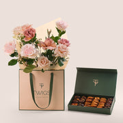 Elegant bouquet of café latte, mondial and quicksand roses in TWIGS beige gift bag paired with premium assorted stuffed dates gift box – luxury flower and dates gift Dubai.