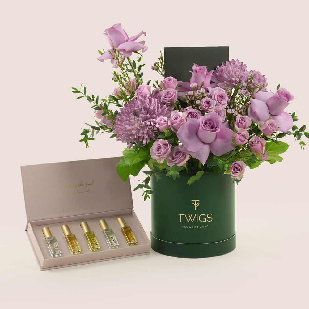 Emirati Women's Day lavender roses and purple chrysanthemums Deluxe round box bundled with Light of Sakina Massarah perfume oil discovery set