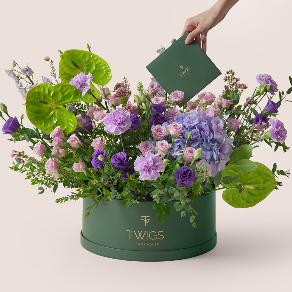 Purple flowers gift set with green anthurium, birthday cake, and purple chrome balloons by TWIGS