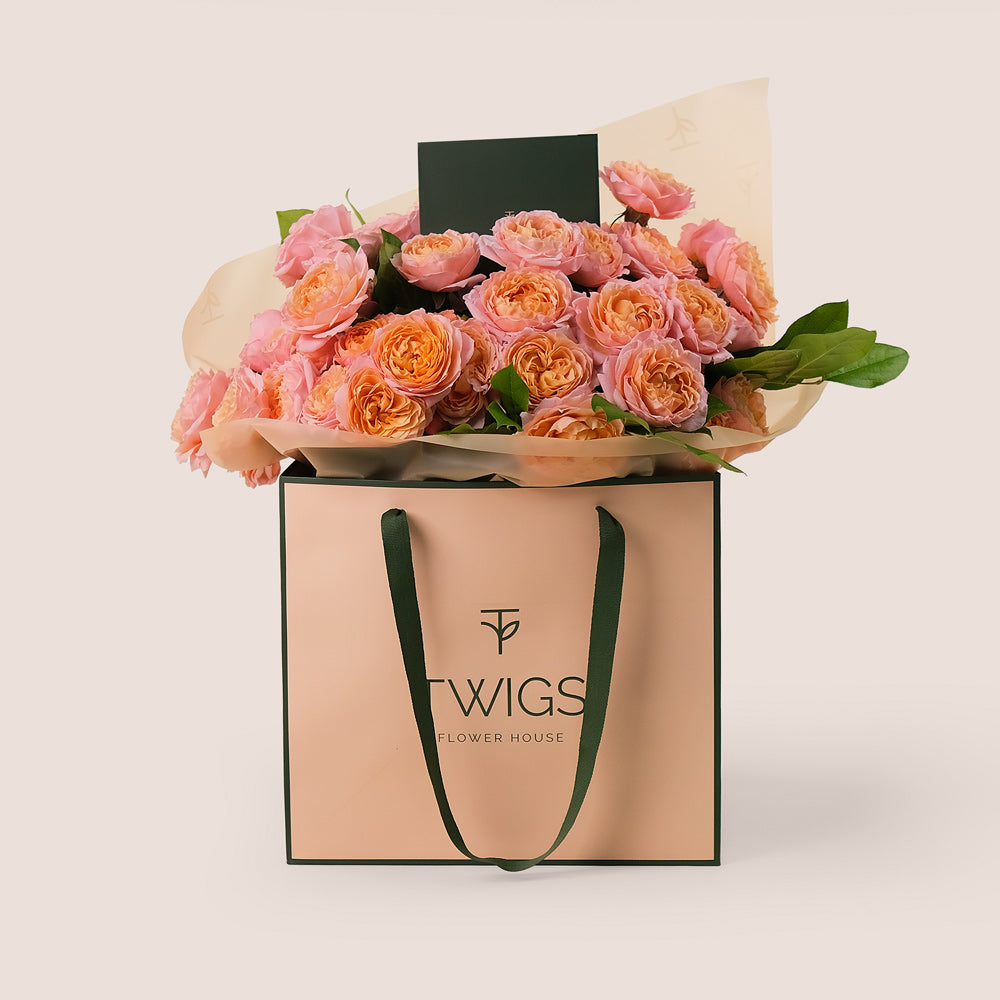 Peach Juliet Spray Roses Hand-Tied Bouquet – Soft Elegance in a Chic TWIGS Flower Bag