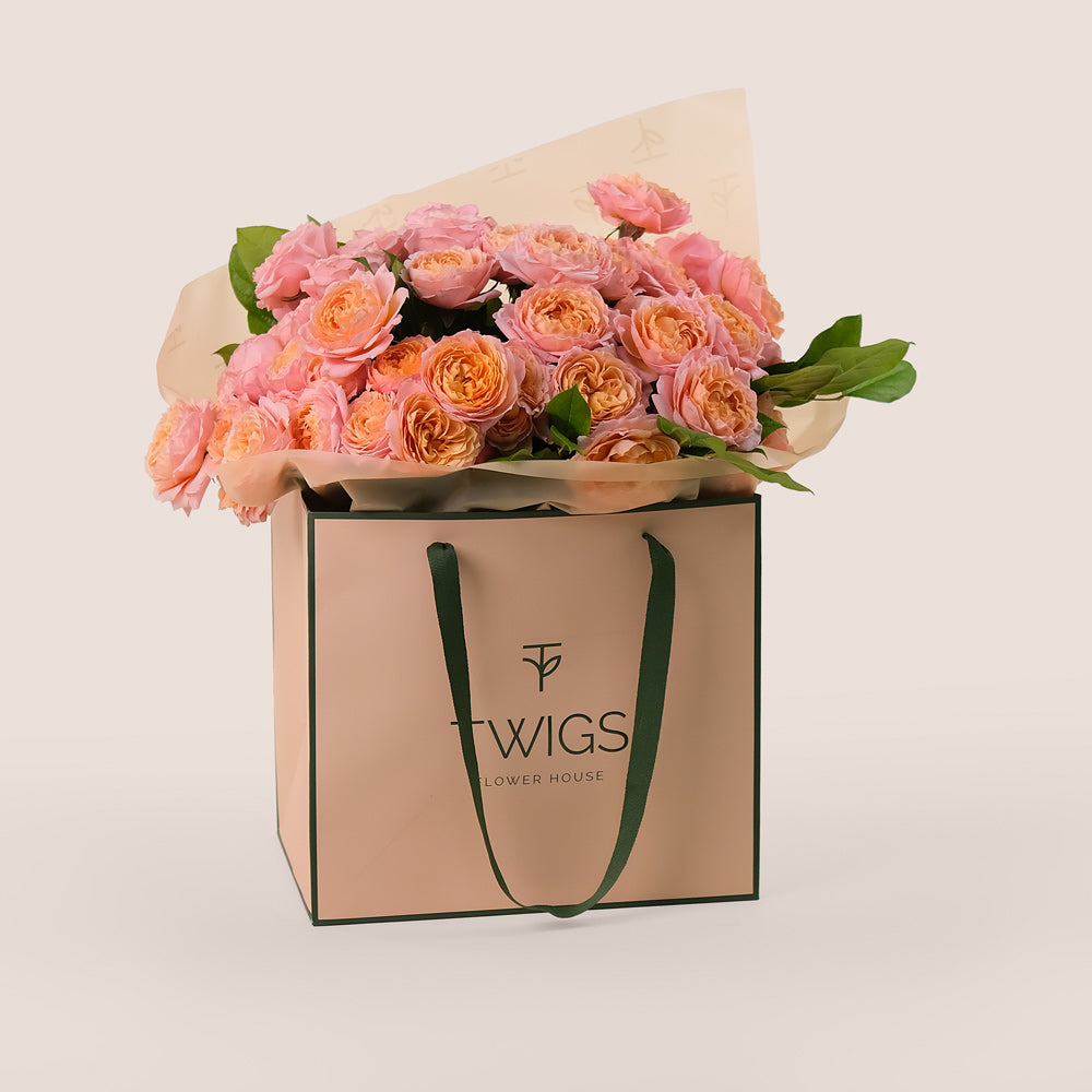 Peach Juliet Spray Roses Hand-Tied Bouquet – Soft Elegance in a Chic TWIGS Flower Bag