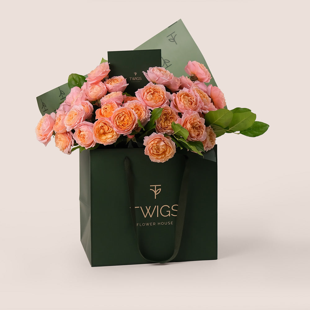 Peach Juliet Spray Roses Hand-Tied Bouquet – Soft Elegance in a Chic TWIGS Flower Bag