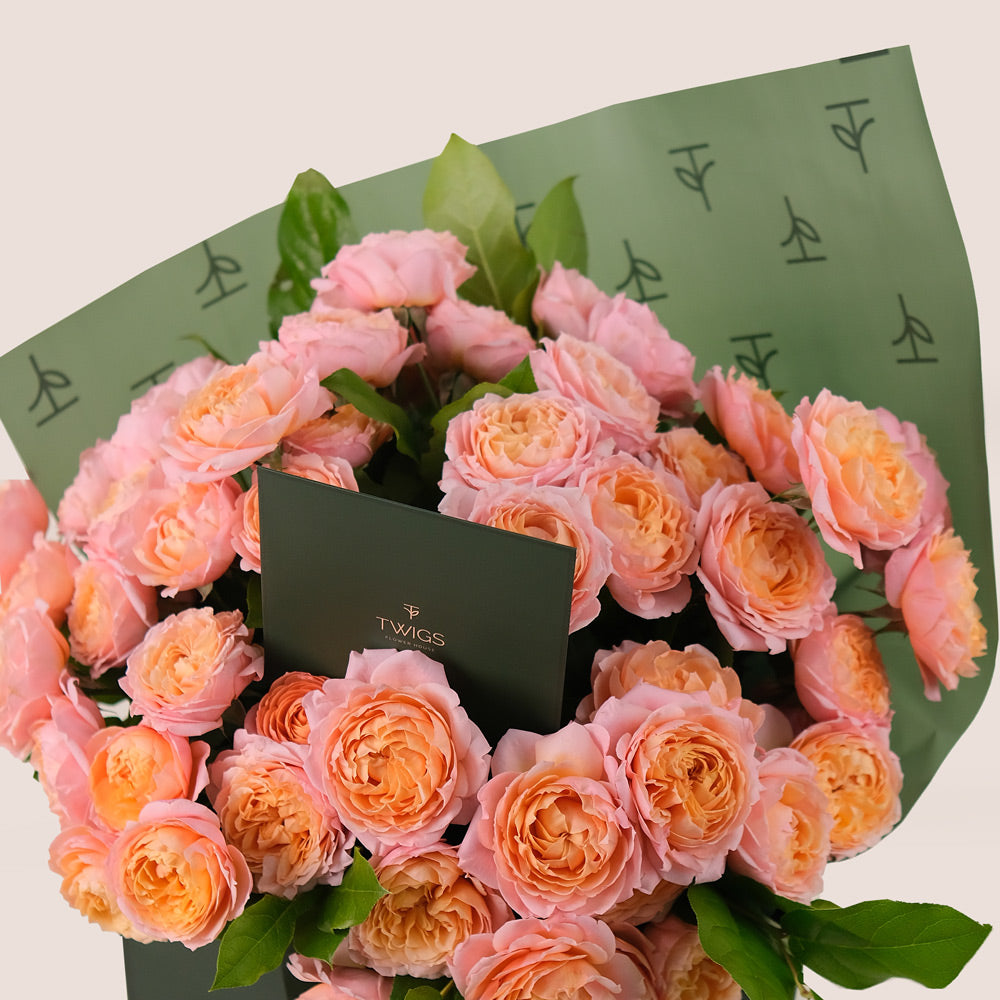 Peach Juliet Spray Roses Hand-Tied Bouquet – Soft Elegance in a Chic TWIGS Flower Bag