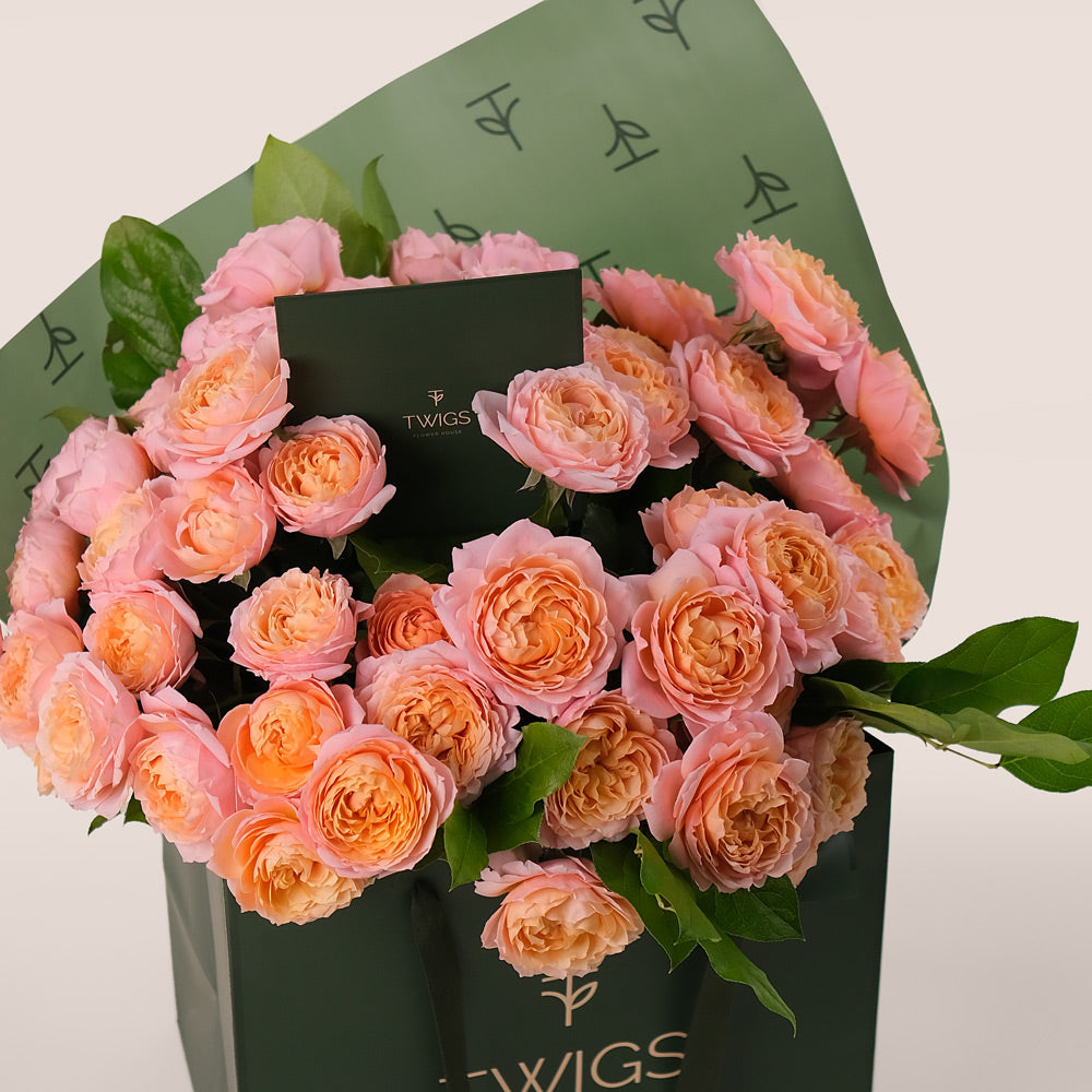 Peach Juliet Spray Roses Hand-Tied Bouquet – Soft Elegance in a Chic TWIGS Flower Bag