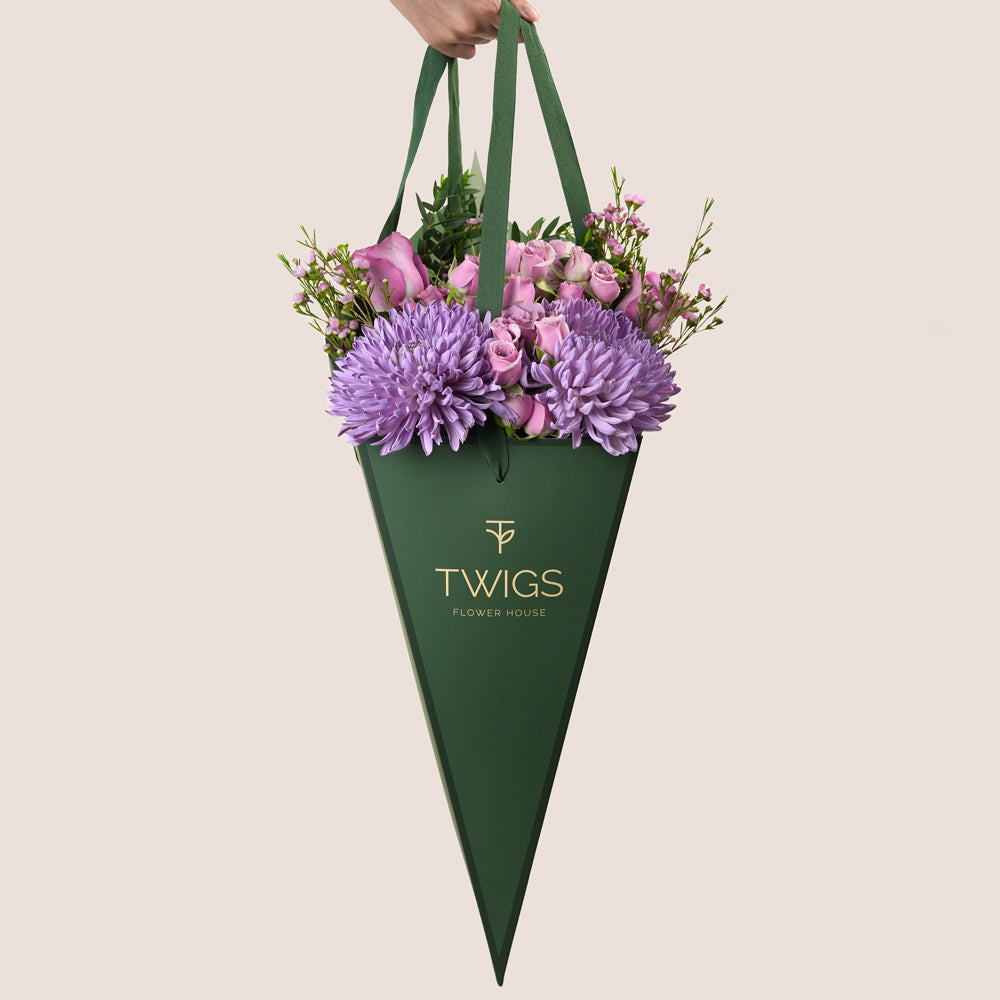 Emirati Women's Day lavender roses and purple chrysanthemums arranged in a TWIGS cone bag, Green and Beige options