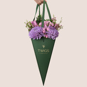 Emirati Women's Day lavender roses and purple chrysanthemums arranged in a TWIGS cone bag, Green and Beige options