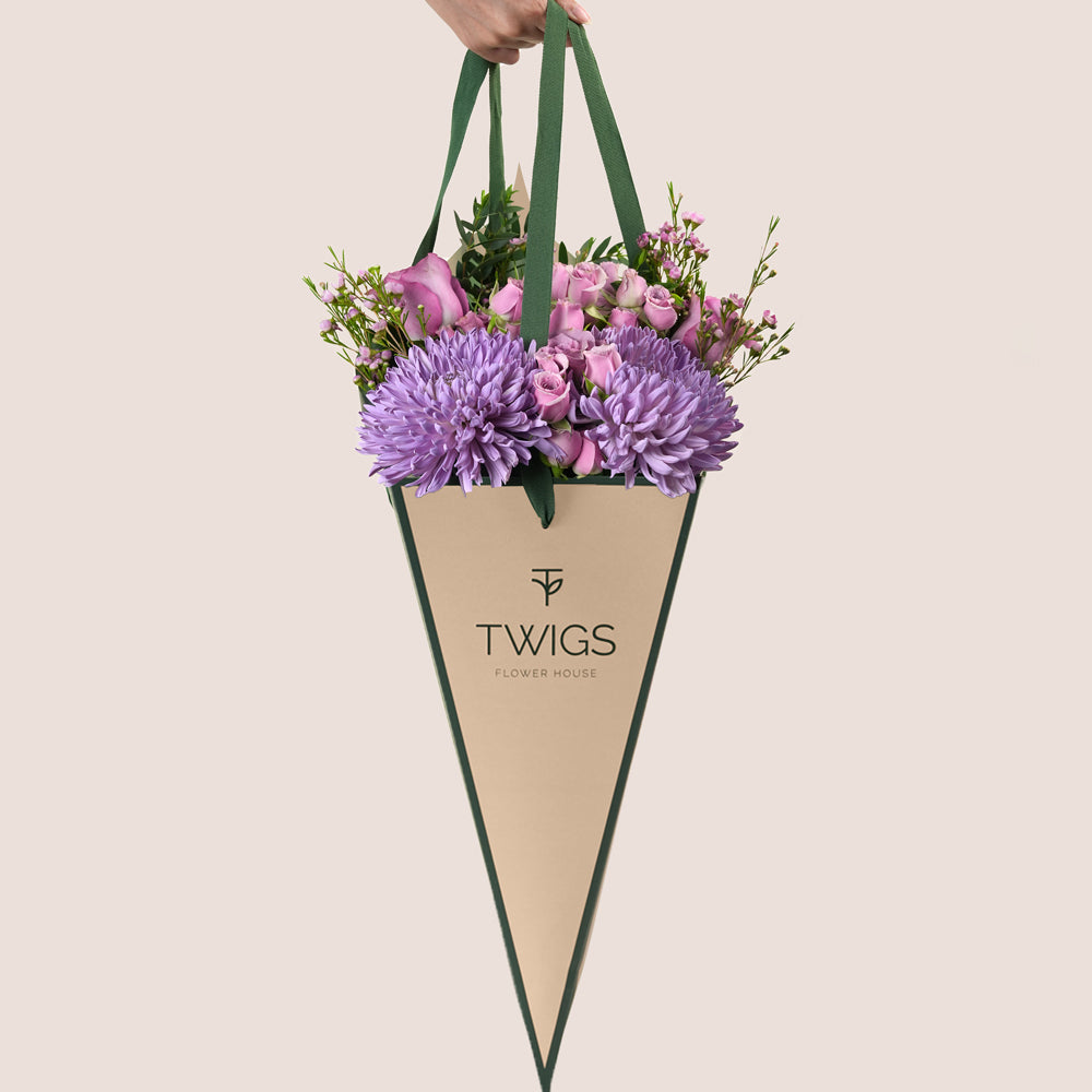 Emirati Women's Day lavender roses and purple chrysanthemums arranged in a TWIGS cone bag, Green and Beige options