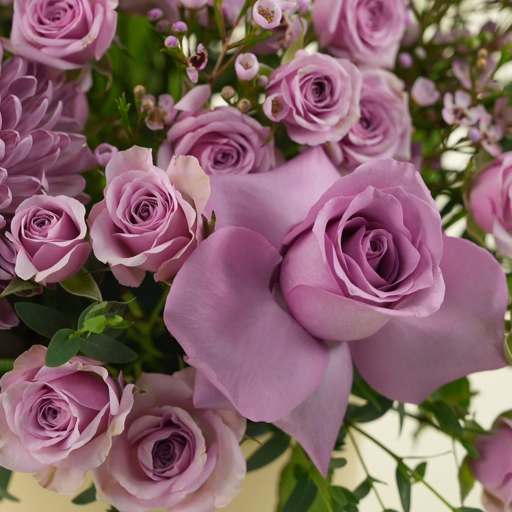 Emirati Women's Day lavender roses and purple chrysanthemums arranged in a TWIGS Deluxe round box, Green and Beige options