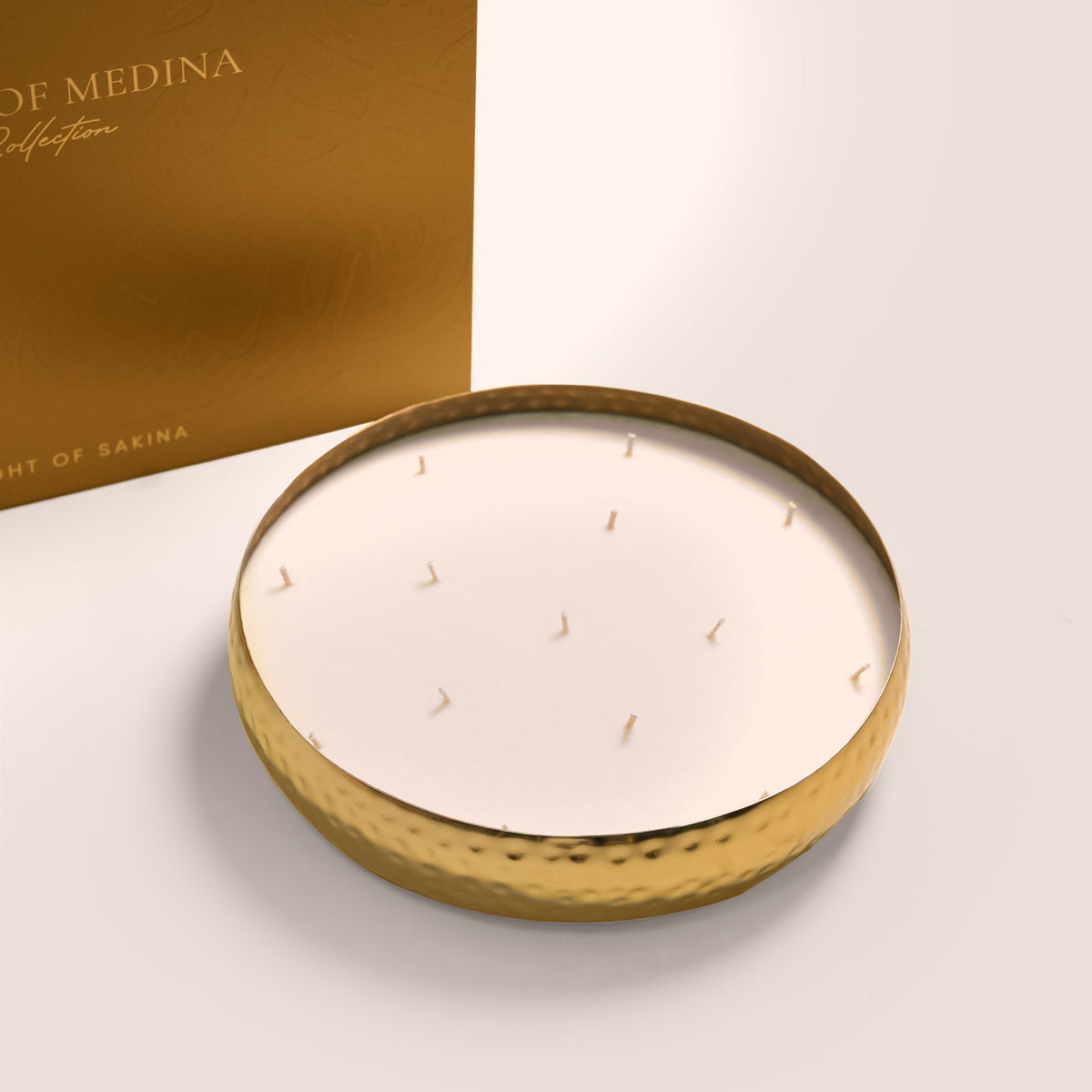 The Palace Candle by Light of Sakina, a 2.5kg luxury soy candle with bergamot, rose, oud, raspberry, and tonka, presented in a handcrafted luxury box.