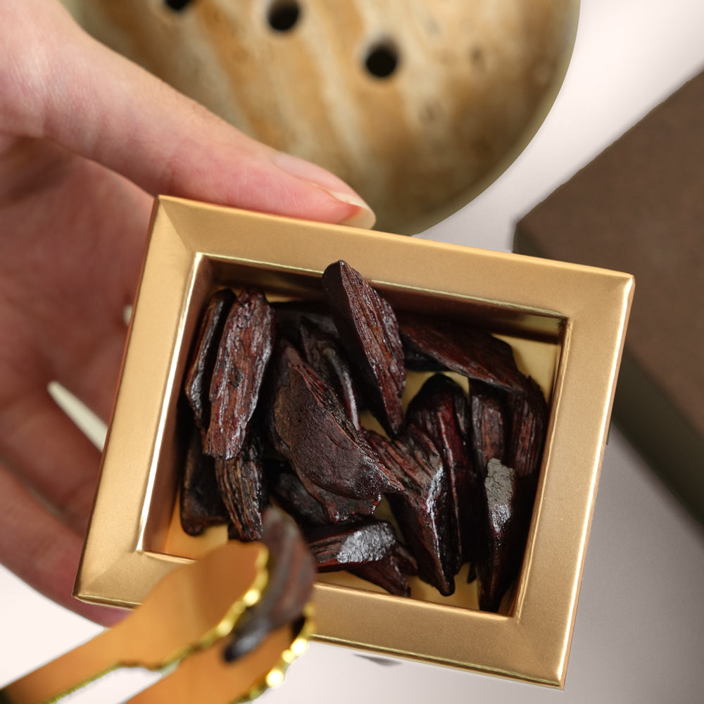 TUBA Jelani bakhoor set with stone mabkhara and gold tongs in open brown gift box, TWIGS x Light of Sakina collaboration