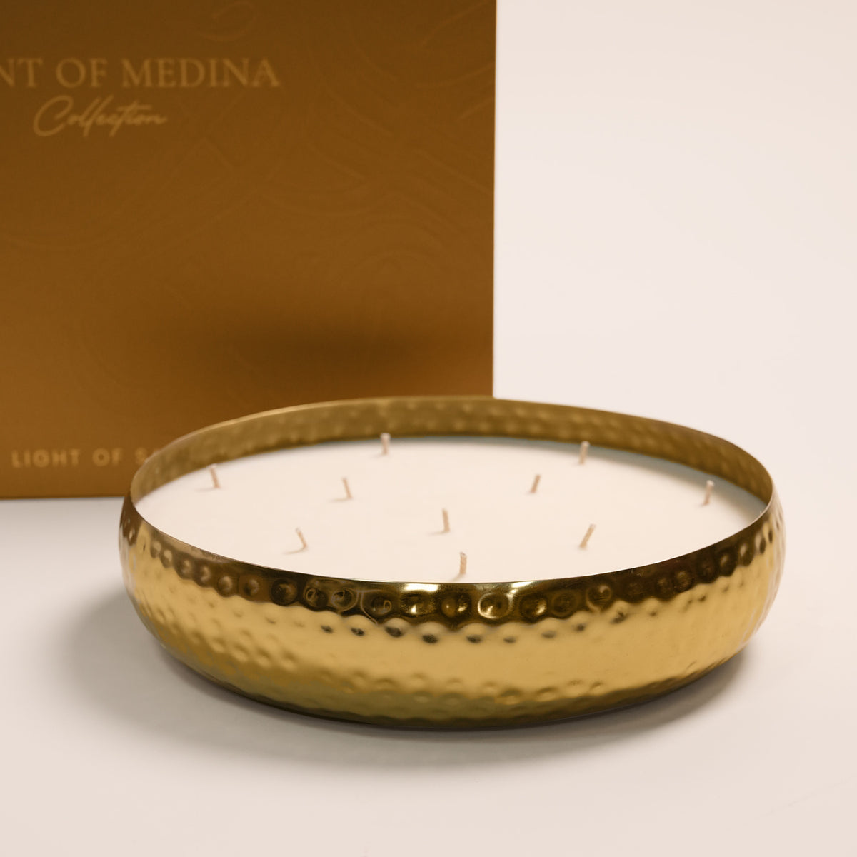The Palace Candle by Light of Sakina, a 2.5kg luxury soy candle with bergamot, rose, oud, raspberry, and tonka, presented in a handcrafted luxury box.